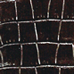 Crocodile texture embossed onto black calfskin